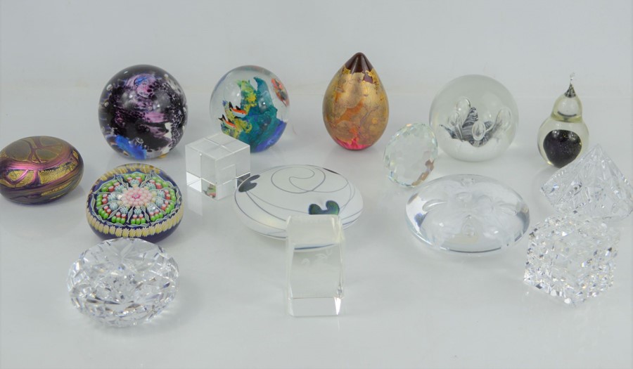 A group of collectible glass paperweights to include Pfeiffer, Caithness, Uredale, Lakeland etc