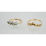 A 9ct gold wishbone ring together with a 9ct gold ring with five white stones set in silver, size