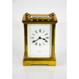 A Mallory of Bath brass carriage clock with Roman numeral dial, 12cm high.