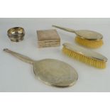 A silver wood lined box and a silver dish together with silver mirror and brush set