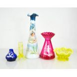 A group of vintage glass to include a cranberry glass vase painted to depict a girl with flowers,
