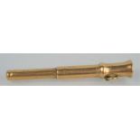 A 9ct gold S. Morden & Co cigar piercer, 8.24g.