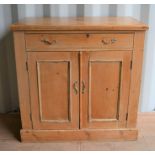 A small pine sideboard with two cupboards and single drawer, 91cm wide by 46cm depth by 92cm high