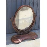 A 19th century mahogany toilet mirror