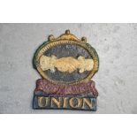 A cast iron painted Union plaque.
