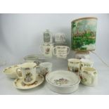 A selection of Wedgwood Beatrix Potter pattern pottery to include lamp base, money box, miniature