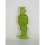 A Chinese Heitian green jade hand carved figural okimono statue.