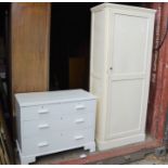 A painted pine cupboard and chest of drawers.