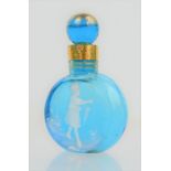 An Edwardian blue glass and gilt scent bottle, hand painted in white to depict girl with umbrella,
