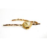A 9ct gold wristwatch, 11.9g total.