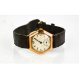 A 9ct gold gentleman's watch with leather strap.