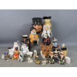 A group of character jugs to include Royal Doulton "John Peel" Roy Kirkham pottery together with a