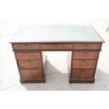 A Victorian pedestal desk with green leather top, 122cm wide by 68cm by 74cm