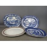 A quantity of Victorian blue and white meat platters, three graduated examples in the Willow pattern