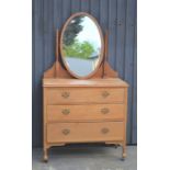 A pine dressing table with mirror, 92cm wide by 46cm depth by 167cm high
