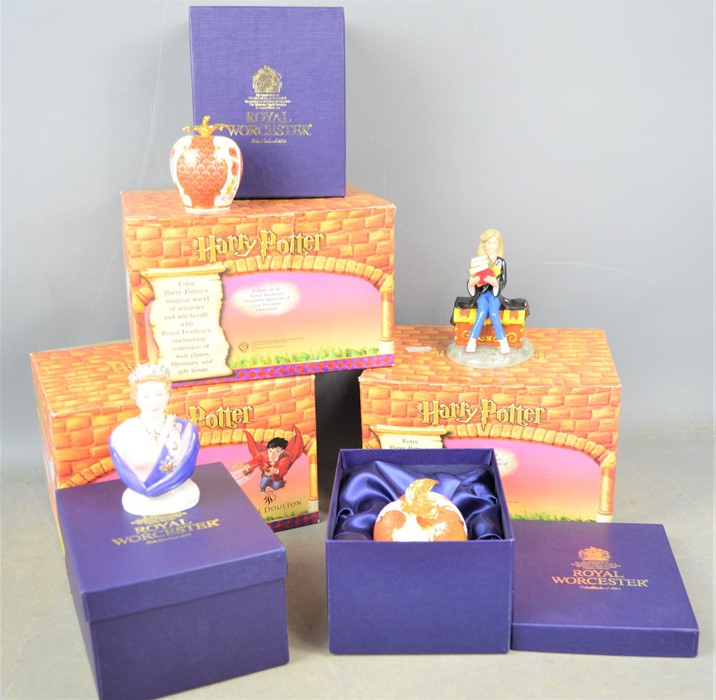 Three Royal Doulton Harry Potter figurines together with three Royal Worcester candle snuffers all