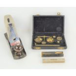 A cased set of pocket balance scales together with a Stanley Bailey plane and H.B Mfg Co Ltd