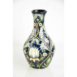 A Moorcroft vase, initialled MRJ to the base, and dated 2004.