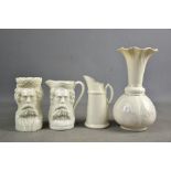 A group of white porcelain to include a Royal Doulton jug, a Belleek vase and a character jug and