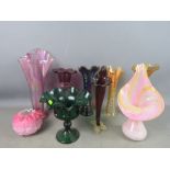 A selection of vintage glassware to include iridescent handkerchief vase in various colour and form