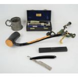 A group of collectibles to include an Irish shillelagh club, shotgun cartridge reloader / maker,