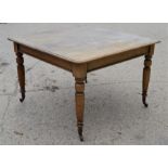 A Victorian mahogany extending dining table with handle, 118cm by 114cm by 75cm high