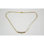 A 9ct gold and amethyst necklace, 6.85g.