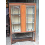 An Edwardian mahogany glazed cabinet.