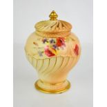 A Royal Worcester blush ivory wyvern shape vase and cover, finely painted with flowers and a