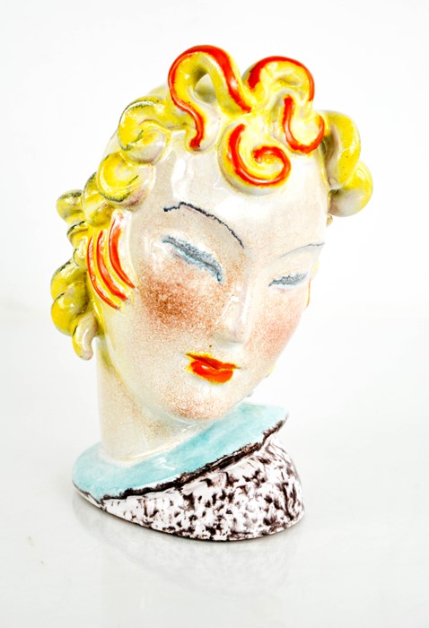 A Goldscheider style female head, Art Deco, 22cm high.