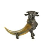 A 19th century bronze and horn bull, the hinged lid in the form of the bulls head, and the horn