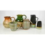 A group of studio pottery jugs, to include two by Petra Wright.