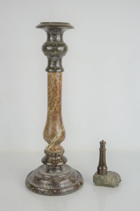 A Cornish Serpentine stone table lamp base, 40cms tall, together with a lighthouse desk weight, a/f