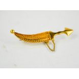A gold (tested as 18ct) dagger form brooch, 7.1g.