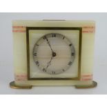 An art deco onyx and marble mantle clock, roman numeral dial 14cm