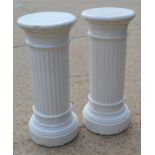 A pair of Corinthian style plaster columns 88cm high