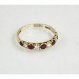An 18ct white gold and diamond ruby ring, size P, 1.9g.