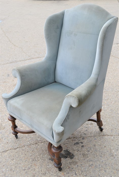 A Carolean style wingback armchair