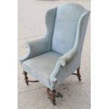 A Carolean style wingback armchair