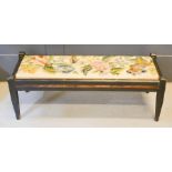 An antique long stool with crewel work upholstered seat, 92 by 34 by 33cm.