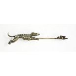 A silver and paste set tie pin, greyhound chasing a hare, 8cm long.