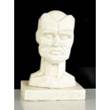 Eduardo Paolozzi (1924-2005) plaster head with personal inscription to the base. 15cms tall