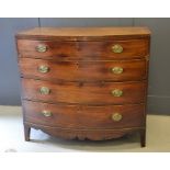 A 19th century bow front chest of drawers, with two over three long drawers, raised on bracket feet,