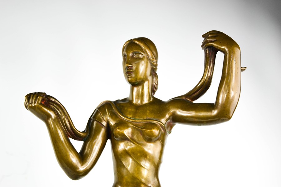 Jaroslaw Horecj (1886-1983): Art deco bronze figure raised on a red marble base, signed beneath - Image 4 of 5