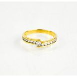 An 18ct yellow gold and diamond ring, size M, 2.5g.