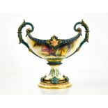 A Royal Worcester boat shaped vase with twin handles, painted with flowers and leaves with blue