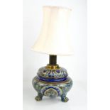 A 19th century Doulton table lamp by Edith Lupton (1875-1890), decorated in dark blue and raised