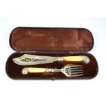A Mappin & Webb silver plated fish slice and fork, with embossed decoration and bone handles, in the