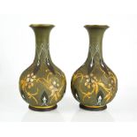 Edith D Lupton (c.1875-1890): a pair of Doulton Lambeth Art Nouveau vases, silicon ware, incised