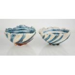 Catriona McLeod (born 1946): two blue and white Studio pottery bowls, signed CMc to the bases.
